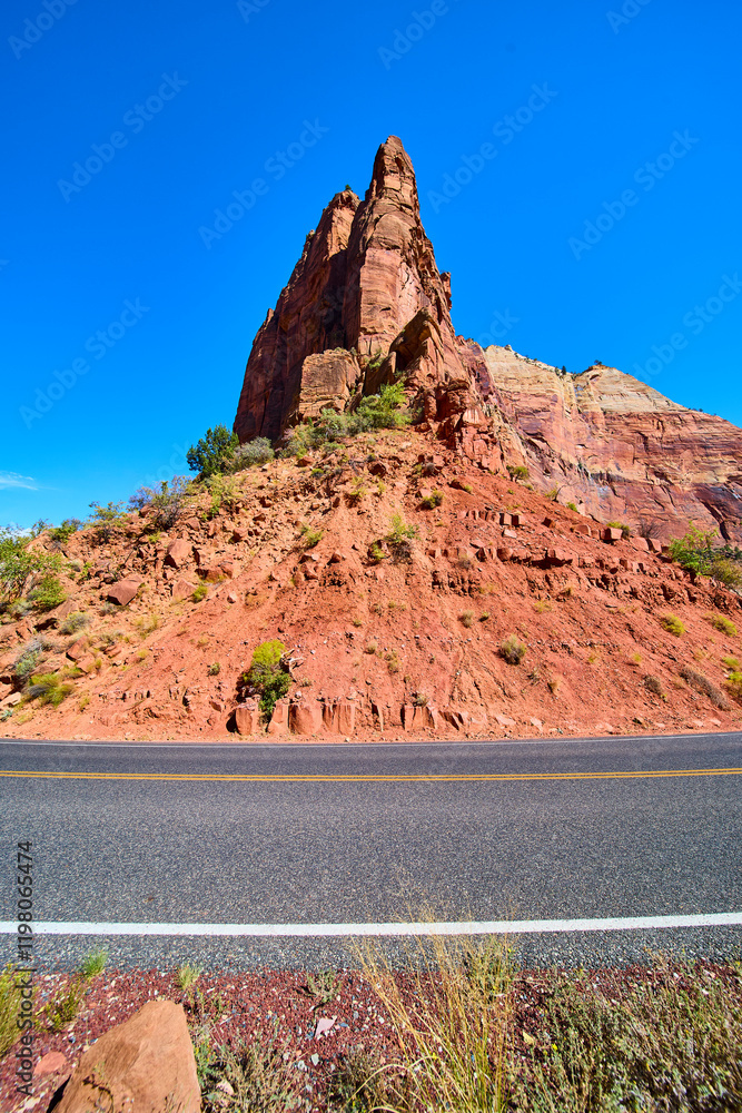 Red Rock Majesty and Desert Road at Zion National Park Low Angle View Red Rock Majesty and Desert Road at Zion National Park Low Angle View
