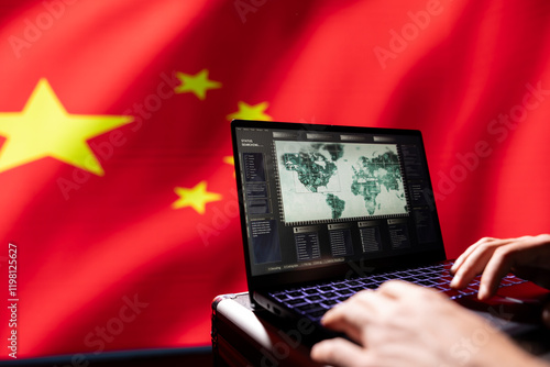 Military agent isolated over Chinese flag engaged in surveillance mission using laptop, looking at aerial map of conflict zone. Communist party regime intelligence officer monitoring zone of interest photo