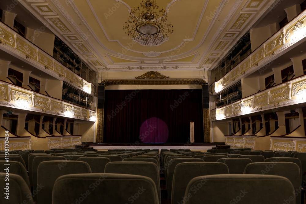 Fototapeta premium Theatre interior with stage and rows of comfortable seats