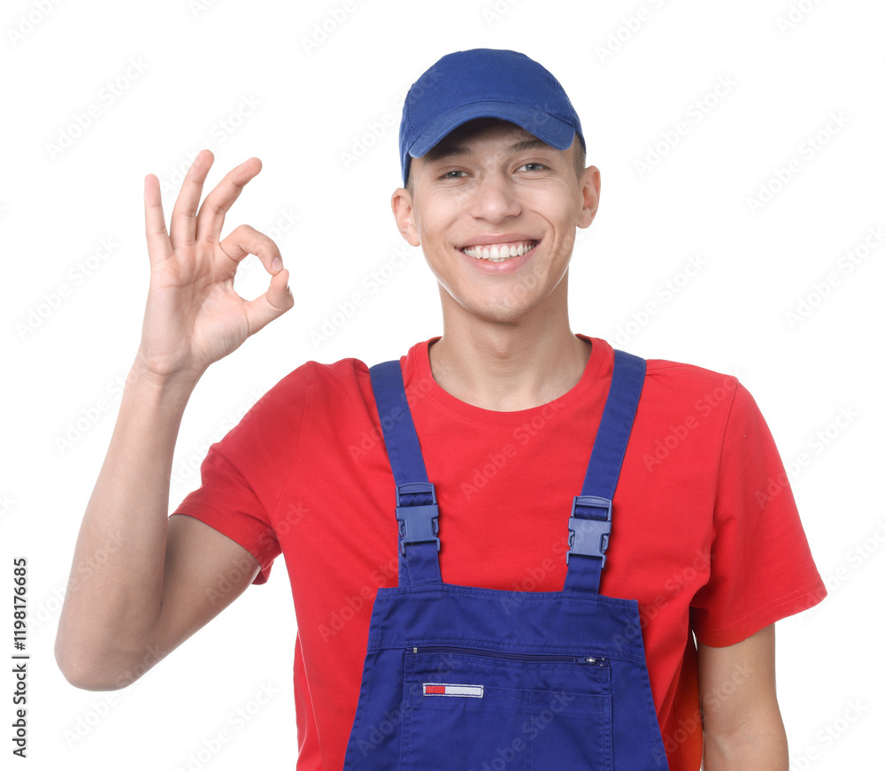Happy young man in uniform showing OK gesture on white background Happy young man in uniform showing OK gesture on white background