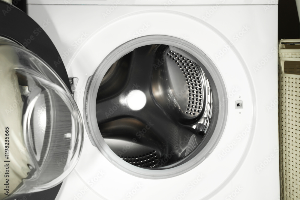 Washing machine with empty drum as background, closeup Washing machine with empty drum as background, closeup