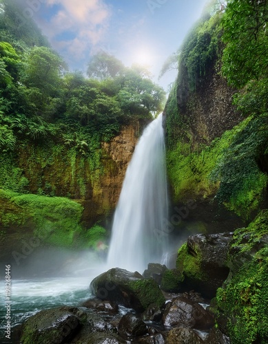 Serene waterfall cascading down mossy cliffs in lush greenery.