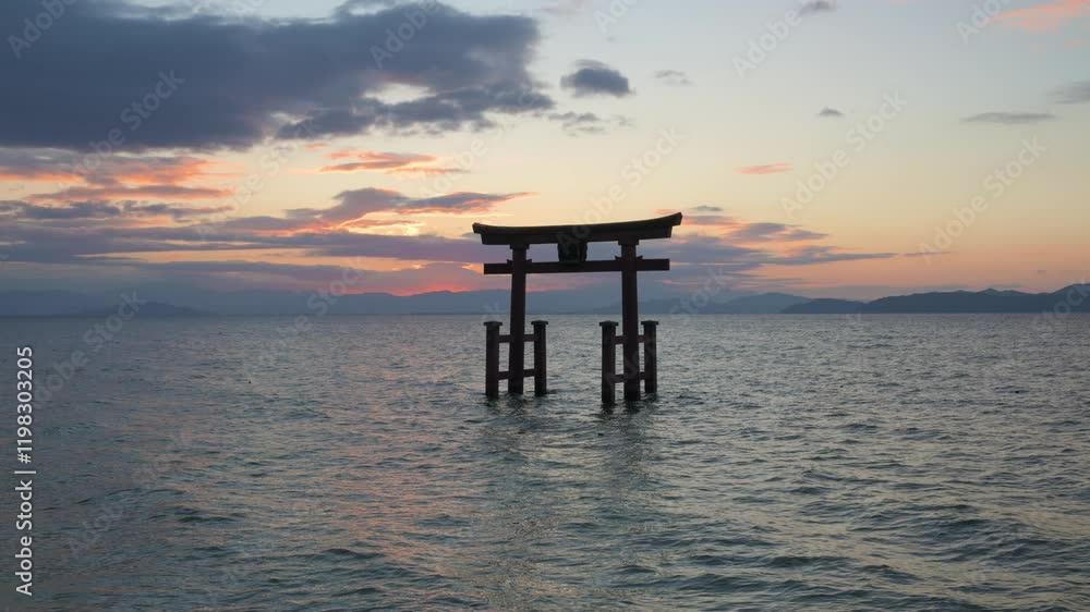 Morning view of Shirahige shrine torii gate from lake Biwa, Japan Morning view of Shirahige shrine torii gate from lake Biwa, Japan