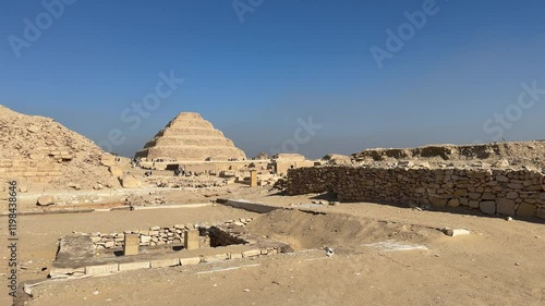 Saqqara - The first pyramid in the world - Its complex houses the Funerary Temple of Djoser, courtyards, chapels and an imposing wall, decorated with reliefs that tell the story of Pharaoh Djoser.