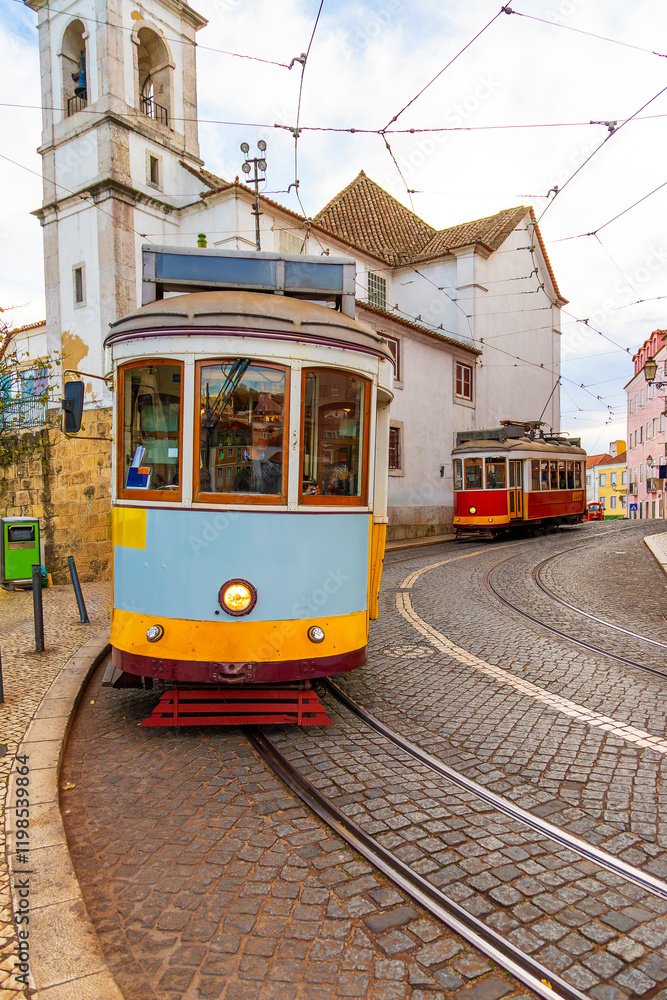 Φωτογραφία Vintage trams winding through the narrow cobbled streets of old town Alfama dist