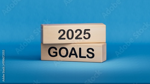 2025 Plans word. Resolution, strategy, solution, goal, business and New Year holiday concepts. Wooden cube blocks. Copy space.3D rendering on blue background.