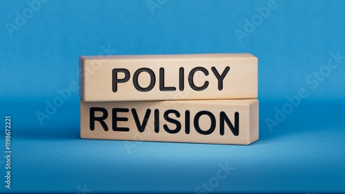 Policy revision symbol. Concept word Policy revision on wooden blocks.Business and Policy revision concept. Copy space.3D rendering on blue background.