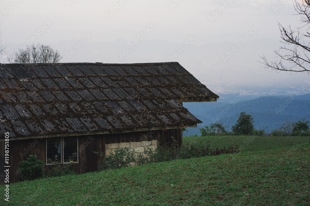 landscape and travel concept with sunlight and cloudy sky with country house on mountain landscape and travel concept with sunlight and cloudy sky with country house on mountain