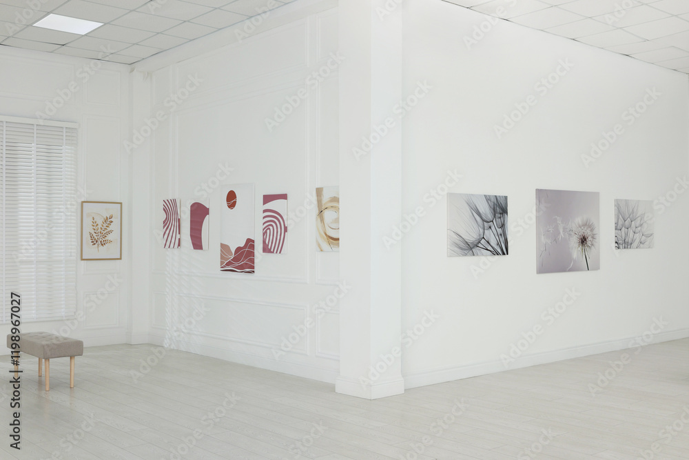 Fototapeta premium Interior of modern art gallery with beautiful paintings