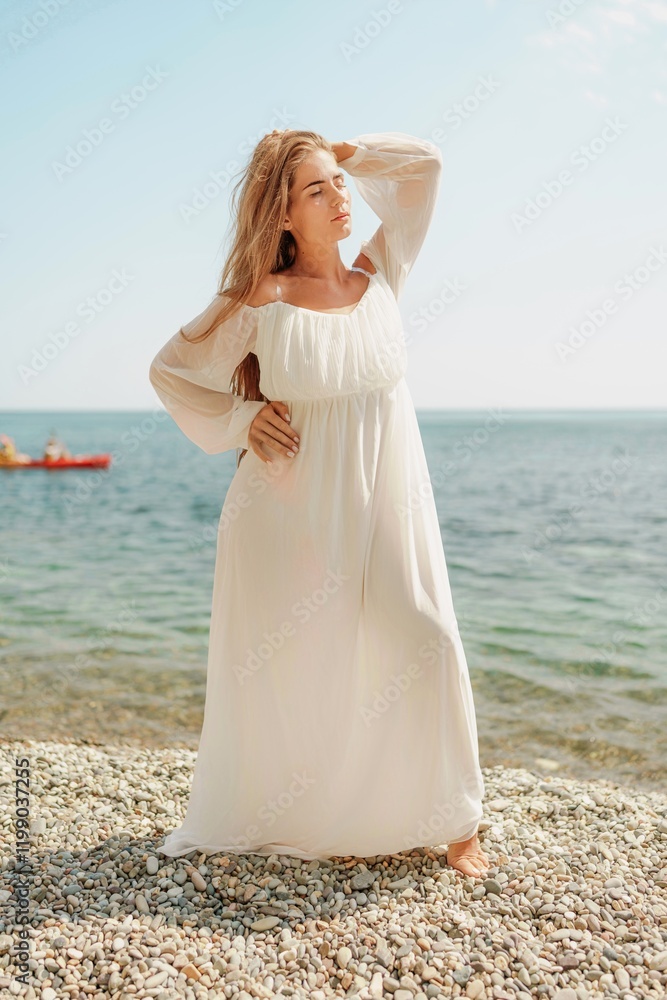 woman white dress stands on a beach, looking out at the ocean. She is in a contemplative or reflective mood, as she raises her hands above her head. Concept of peace and tranquility. woman white dress stands on a beach, looking out at the ocean. She is in a contemplative or reflective mood, as she raises her hands above her head. Concept of peace and tranquility.