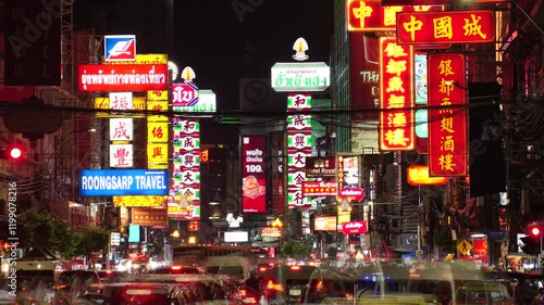 BANGKOK, THAILAND - AUGUST 2024 : View of China town Yaowarat road. Time lapse shot at night.