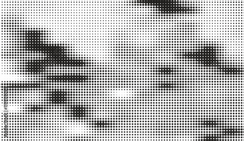 Abstract Halftone Pattern Displaying Dynamic Black Shapes on a White Background, creating a textured optical illusion with varying dot density