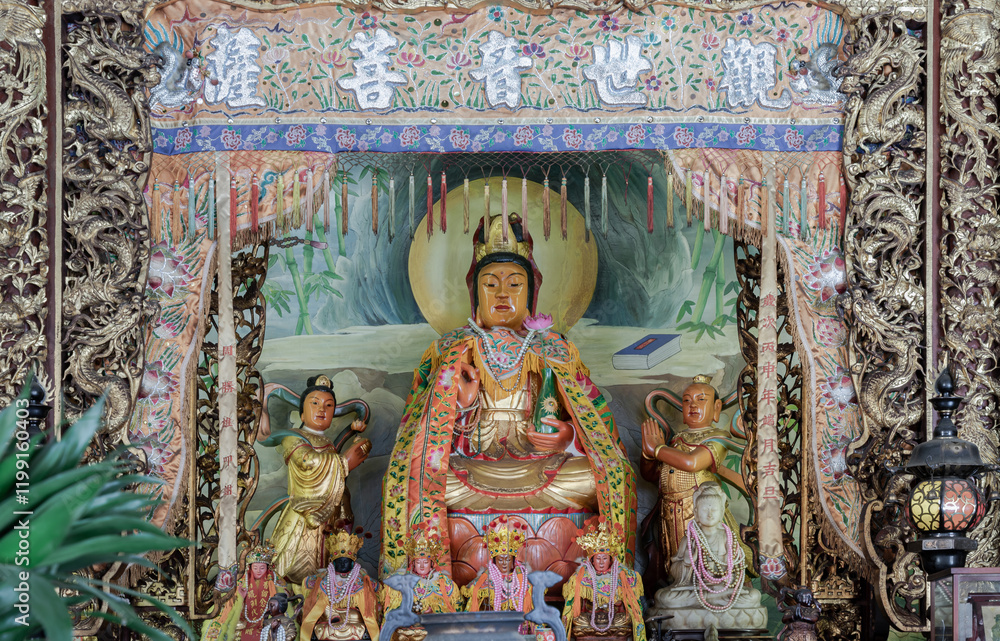 Quan Yin Statue(Guan Yin Buddha) in Kuan Yin shrine inside the Buddhist temple of Wat Dhammakatanyu (Xian Lo Dai Tien Gong). Taiwanese art style, use it as your Wallpaper, Poster and Space for text.