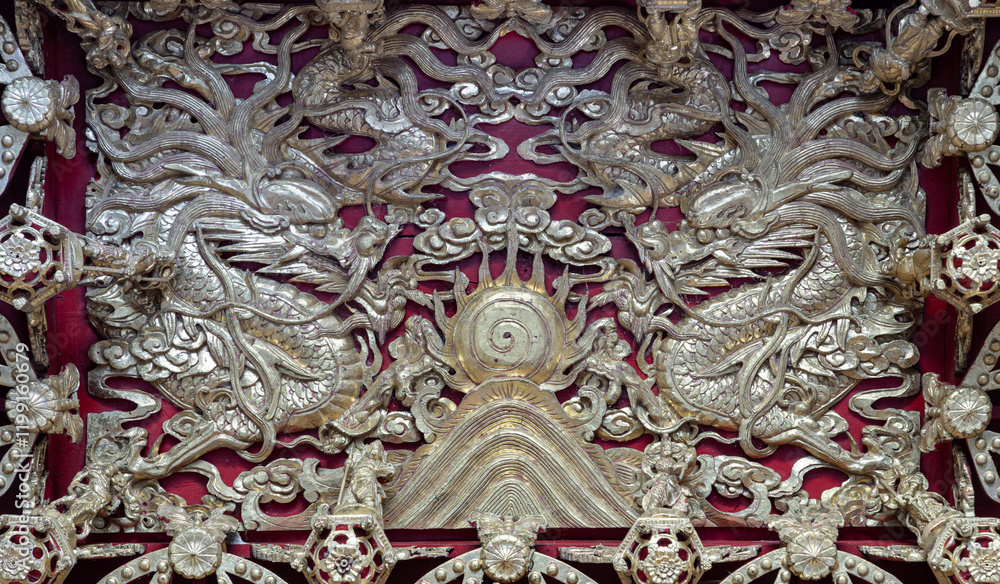Elaborate sculptures on ceiling design inside the Buddhist temple of Wat Dhammakatanyu (Xian Lo Dai Tien Gong). Taiwanese art style, Look up, use it as your Wallpaper, Poster and Space for text.