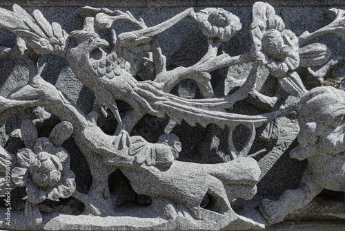 Obraz na płótnie The relief on Elaborate sculptured of Stone carvings is a beautiful Taiwanese art style. Surface texture of Stucco art in Taiwan temple, use it as your Wallpaper, Poster and Copy space,Selective focus w salonie