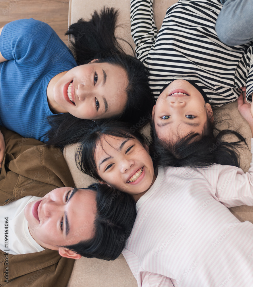 Portrait of young Asian family frome above Portrait of young Asian family frome above