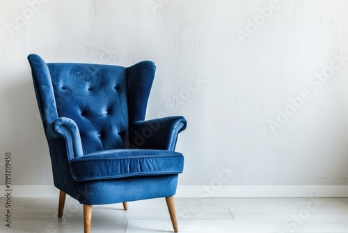 A modern blue floral velvet armchair featuring wooden legs, perfect for a cozy sitting area. photo