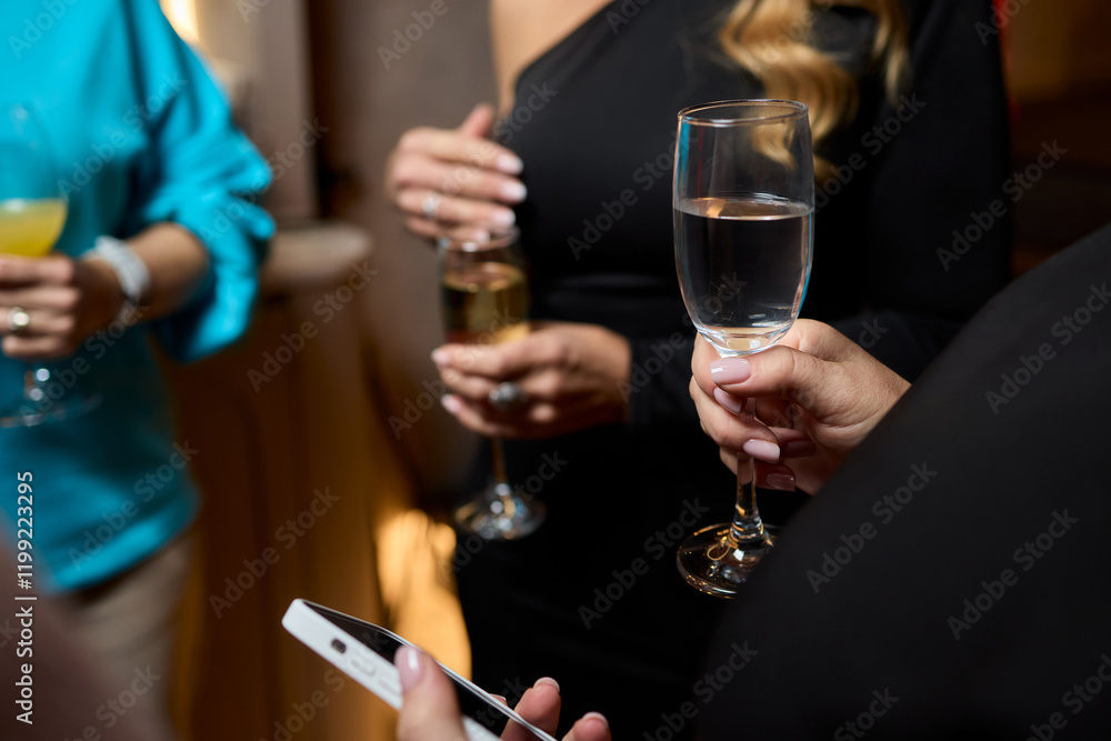 Cheers to a Fantastic Celebration Friends Joyfully Toasting with Wine Glasses in Hand Cheers to a Fantastic Celebration Friends Joyfully Toasting with Wine Glasses in Hand