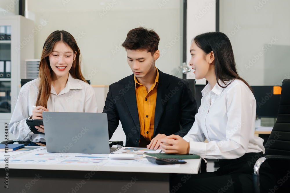 Asian business people discussing on performance revenue in meeting. businessman working with co-worker team. financial adviser analysing data with investor. Asian business people discussing on performance revenue in meeting. businessman working with co-worker team. financial adviser analysing data with investor.