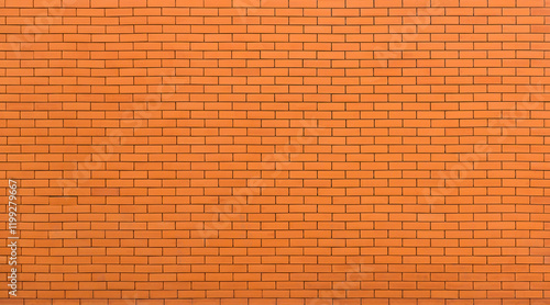 Seamless orange brick wall with clean and uniform arrangement pattern texture background photo