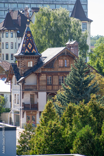 Old wooden house exterior. Wood window balcony. Ukrainian architecture Truskavets photo