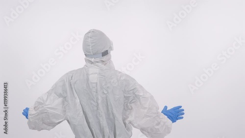 A scientist in PPE showing a 'no access' sign on a white background
