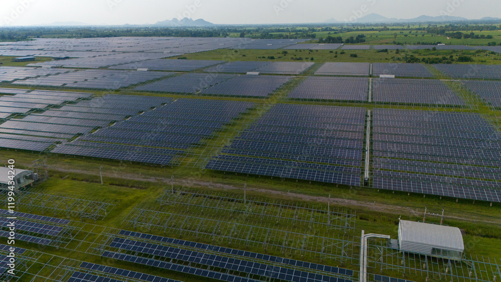 Aerial bird view photo of photovoltaic power station also known as a solar park is large-scale photovoltaic system (PV system) designed for the supply of merchant power into the electricity grid Aerial bird view photo of photovoltaic power station also known as a solar park is large-scale photovoltaic system (PV system) designed for the supply of merchant power into the electricity grid
