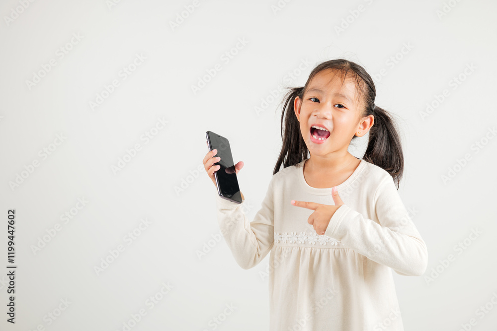 Portrait Asian happy young kid girl smile making finger pointing on screen smartphone in hand, Kindergarten children attractive shopping online application isolated studio shot white background Portrait Asian happy young kid girl smile making finger pointing on screen smartphone in hand, Kindergarten children attractive shopping online application isolated studio shot white background