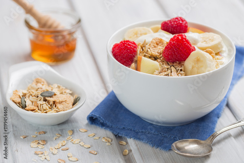 Muesli with flakes and fresh fruits, healthy delicious breakfast
