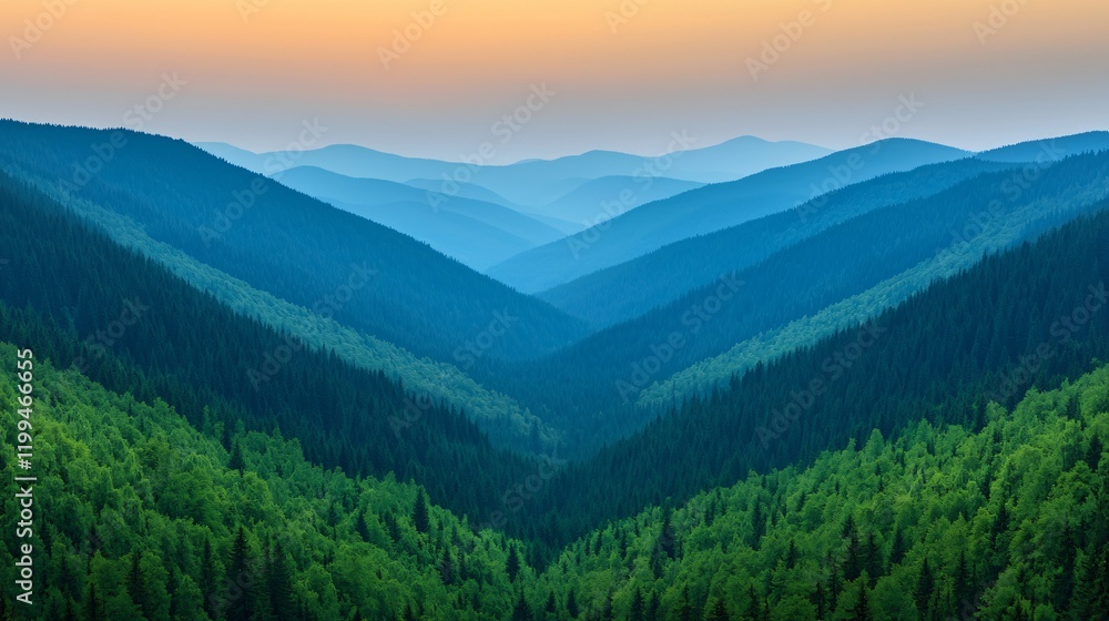 Serene sunset over lush green valley and blue mountain ranges. Serene sunset over lush green valley and blue mountain ranges.
