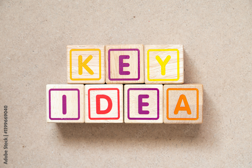 Alphabet letter block in word key idea on wood background Alphabet letter block in word key idea on wood background
