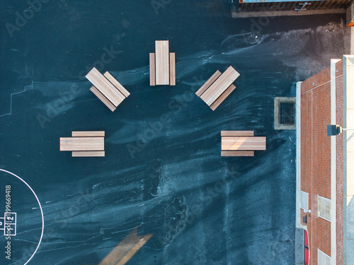 Φωτογραφία Picnic tables outside for recess at the schoolyard