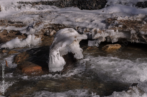 melting dirty ice on the river photo