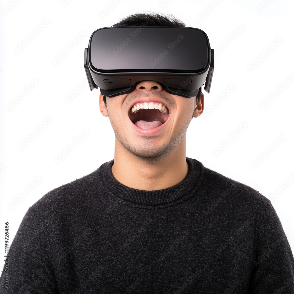 Asian man in VR glasses virtual reality creative. Young man enjoying virtual reality experience with excitement and joy. Asian man in VR glasses virtual reality creative. Young man enjoying virtual reality experience with excitement and joy.