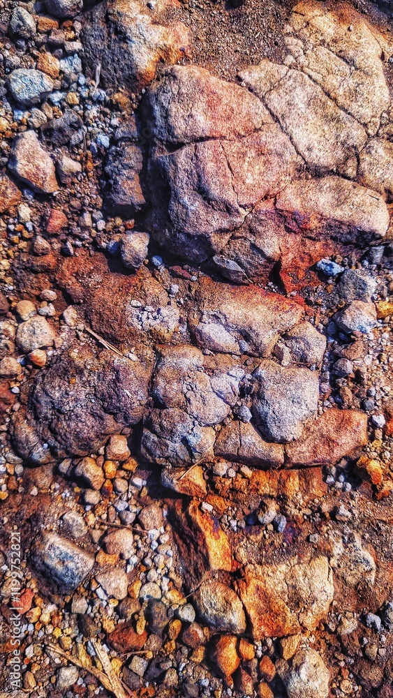 Textured aged brown color rock pattern of skin of earth Textured aged brown color rock pattern of skin of earth