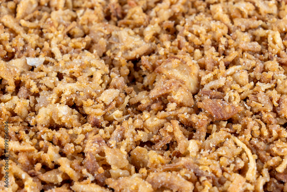 Fried dried onion, close-up. a popular snack food, garnish. Fried dried onion, close-up. a popular snack food, garnish.