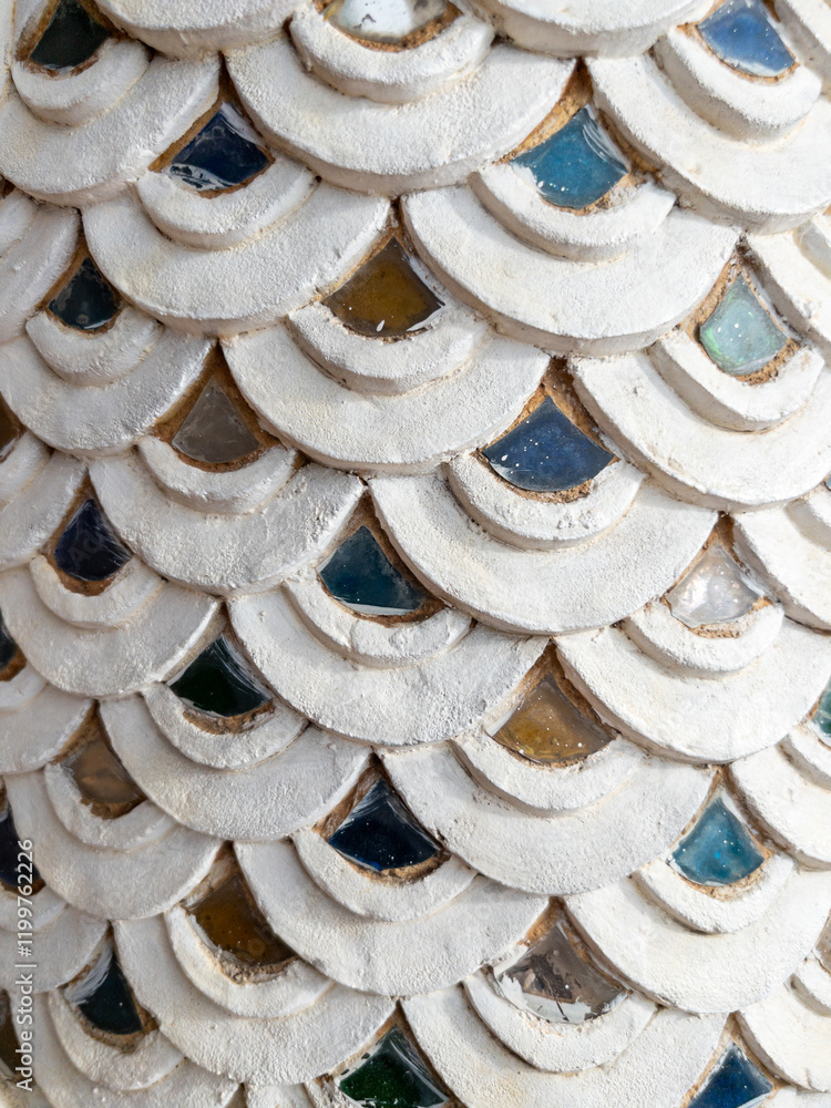Traditional Thai Stucco Serpent-Scale Pattern with Glass Accents.