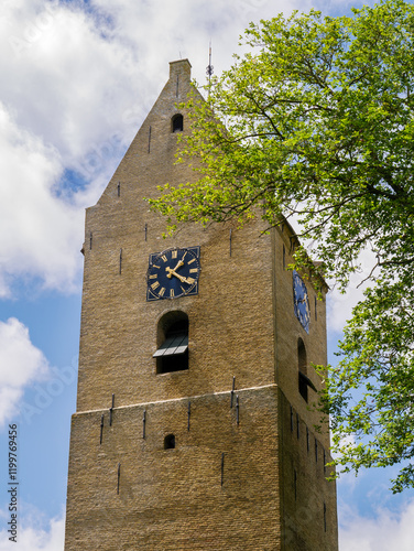 Foto Dorpstoren, former church tower, in old town of Nes on West Frisian island Amela