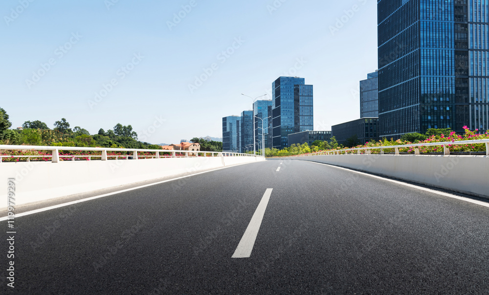 Highway overpass near office buildings Highway overpass near office buildings