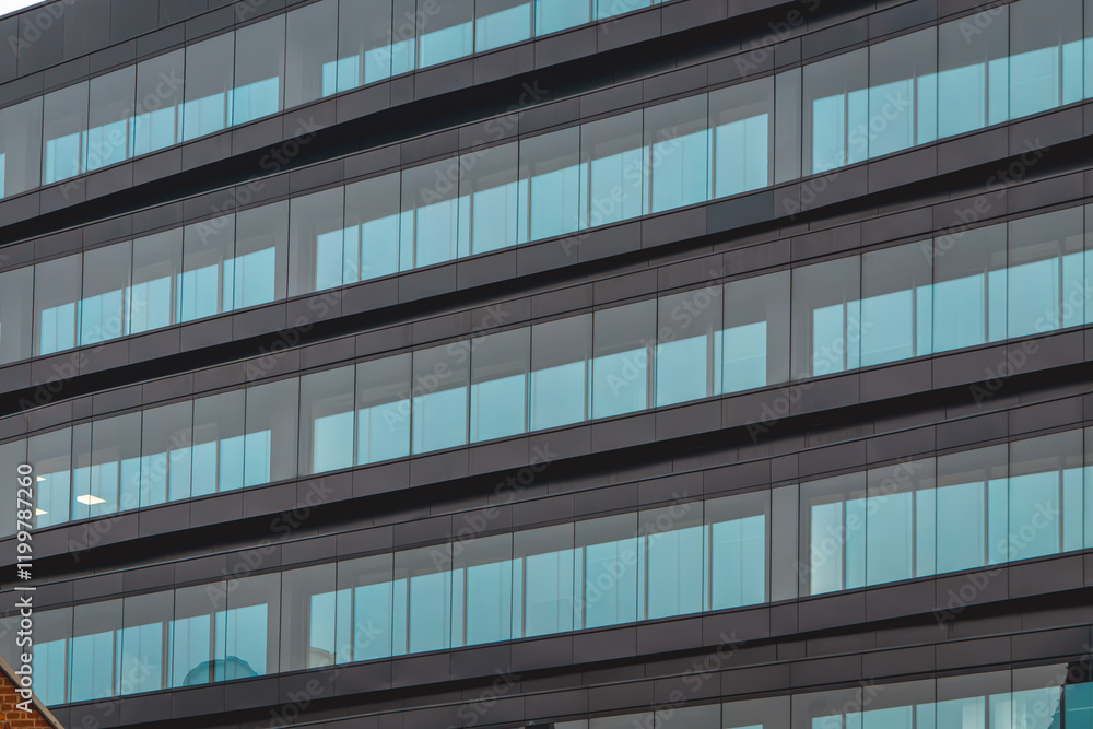 modern office building, glazed office building with large windows. Modern architecture and urban construction. advanced engineering and construction. modern office building, glazed office building with large windows. Modern architecture and urban construction. advanced engineering and construction.