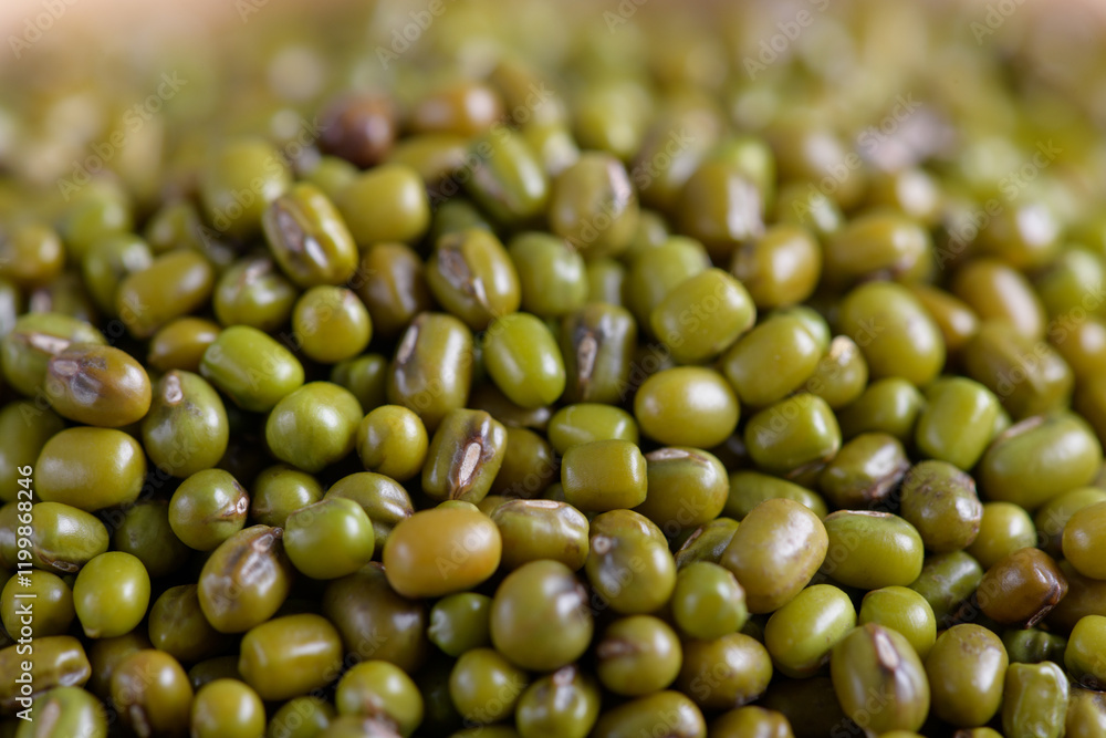 Mung beans background, close up. Healthy plant-based protein, healthy cooking ingredient for vegan recipes and vegetarian diets Mung beans background, close up. Healthy plant-based protein, healthy cooking ingredient for vegan recipes and vegetarian diets