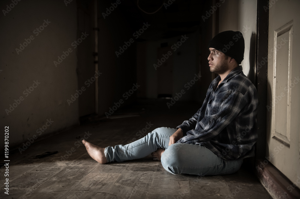 A junkie experiences drug hallucinations. With a look of terror and fear on his face A junkie experiences drug hallucinations. With a look of terror and fear on his face