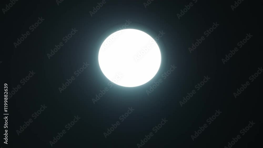 Gradual change in the color of the spotlight. The match cat effect. From light to dark. Abstraction. The concept of a lamp that looks like the moon