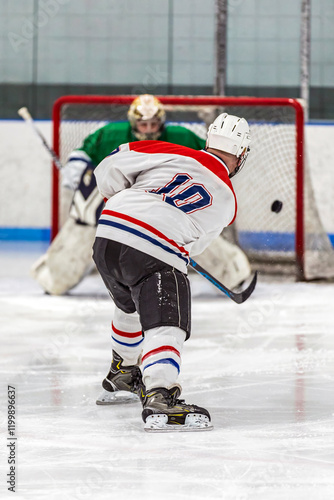 Photography Ice Hockey Action: Player Shooting on Goal