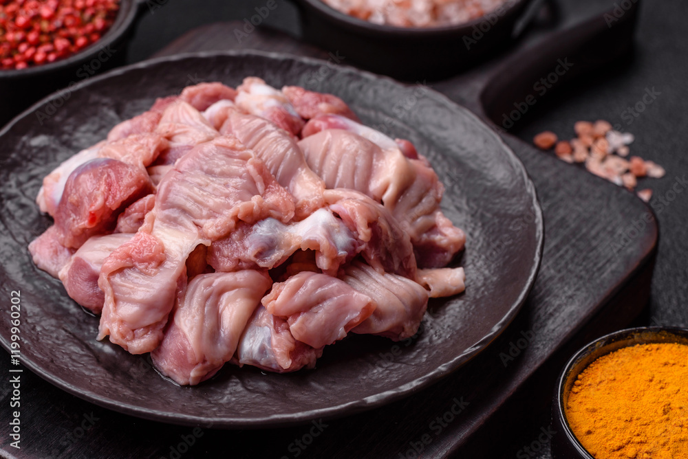 Raw chicken or turkey stomach with salt, spices and herbs Raw chicken or turkey stomach with salt, spices and herbs