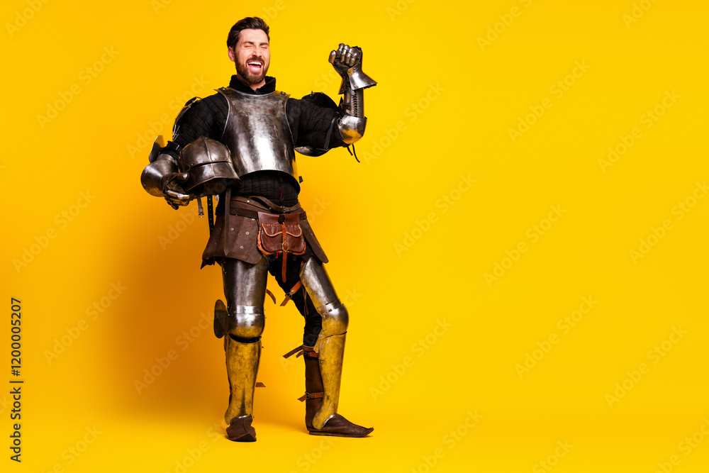 Confident knight in metallic armor poses on yellow background showcasing bravery and medieval style Confident knight in metallic armor poses on yellow background showcasing bravery and medieval style