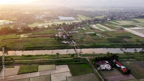 Idah afternoon aerial video of sunset in rice field villages, 4k resolution photo