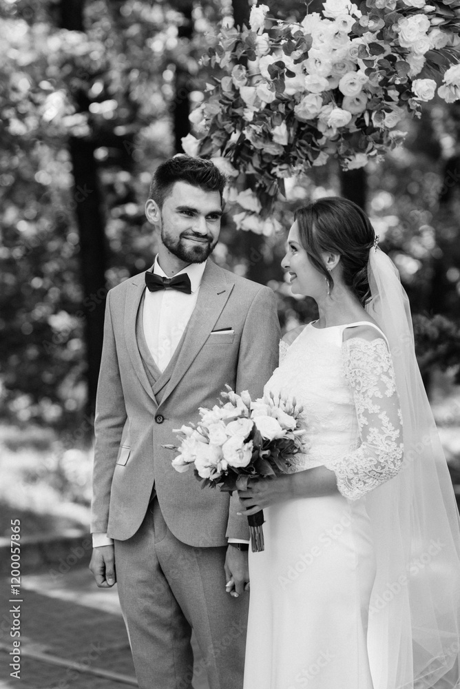 wedding ceremony of the newlyweds on the glade