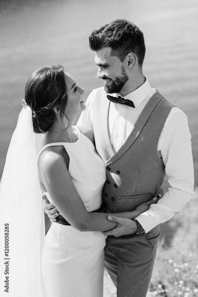 bride blonde girl and groom near the river