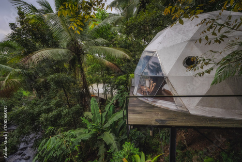 Obraz na płótnie Experience the breathtaking beauty of a stunning geodesic dome, surrounded by a vibrant tropical landscape that offers an immersive and calming nature experience, East Java, Indonesia w salonie